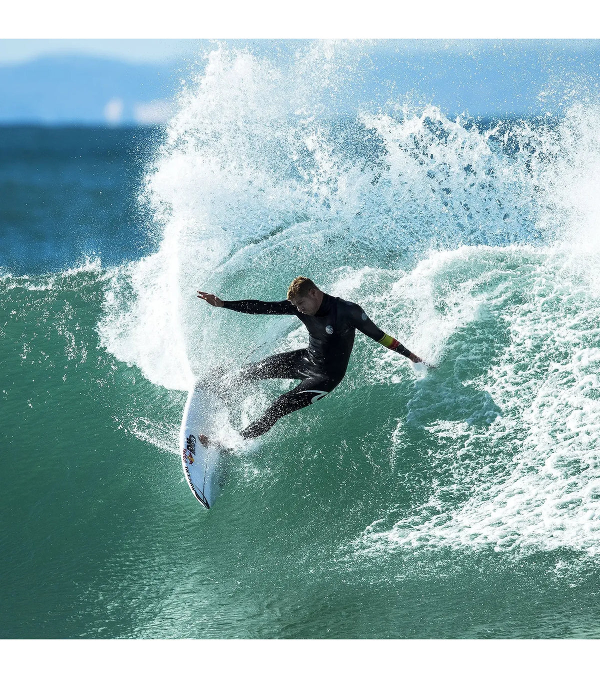 FCS II Mick Fanning Performance Core Thruster Fins - Black / Mango